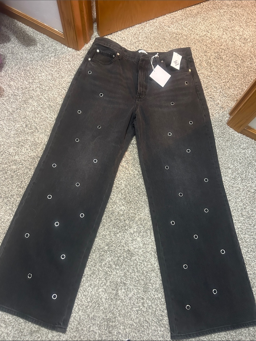 High rise/baggy Jeans with Silver Eyelet Detail